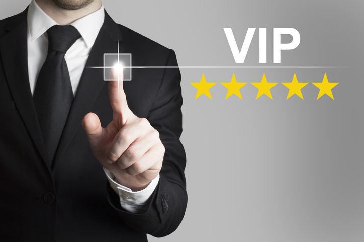 businessman pushing button vip stars